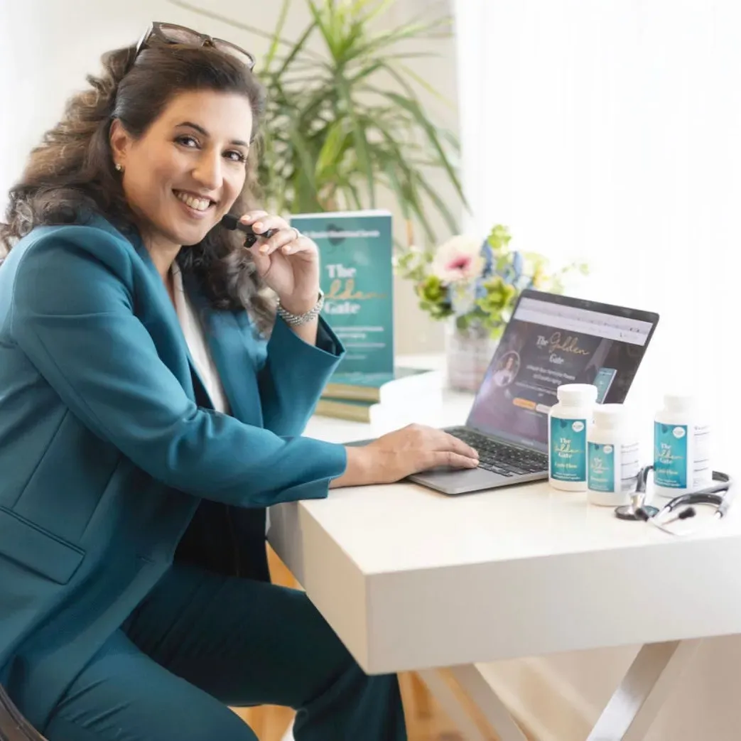 Dr. Darvish at her desk with The Golden Gate