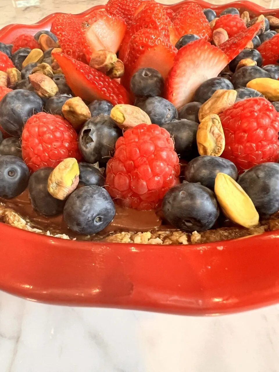 Rich raw cacao mousse pie served as a healthy antioxidant-packed dessert alternative